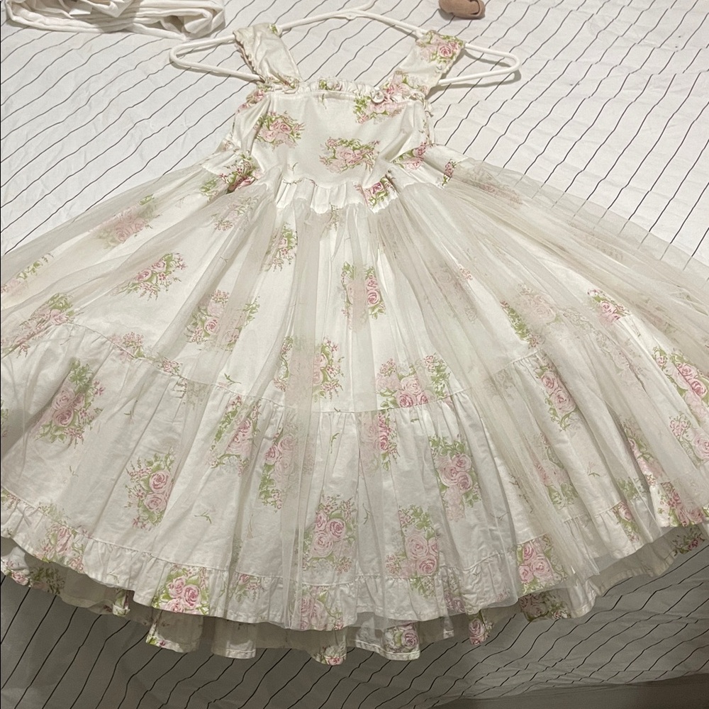Elegant White Dress with Pink Floral Design